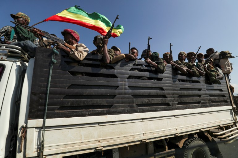 Amhara fighters ride to face Tigray People's Liberation Front forces near the border with Tigray, Ethiopia [File: Tiksa Negeri/Reuters]