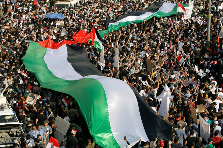 Hundreds of demonstrators have gathered in cities across Iraq to stand in solidarity with Palestinians in Gaza and Jerusalem [Reuters]