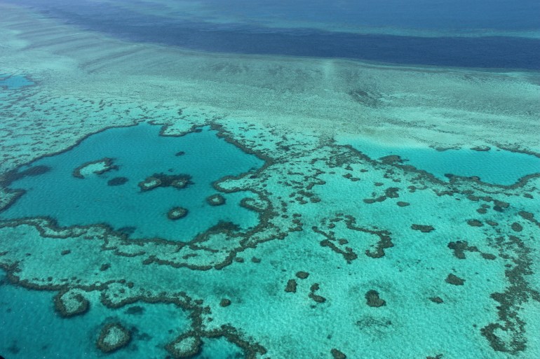 An aerial view of the Great Barrier Reef off the coast of the Whitsunday Islands