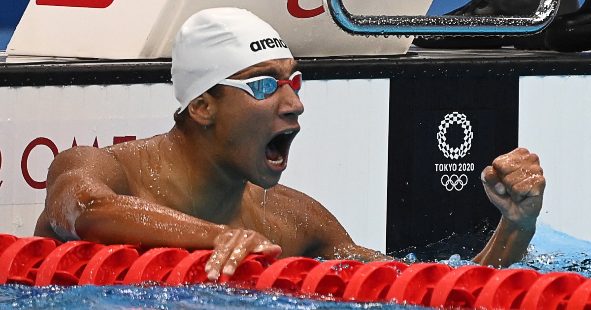 Slowest to qualify, Tunisian Hafnaoui wins Olympic swimming gold