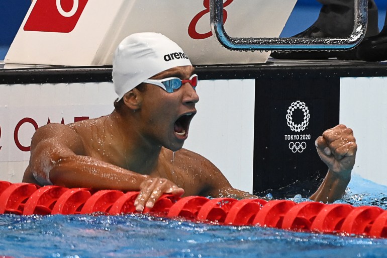 Ahmed Hafnaoui joined Ous Mellouli to be the only Tunisians to win a gold in swimming [Attila Kisbenedek/AFP]