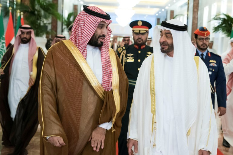 Competition between Abu Dhabi's Crown Prince Sheikh Mohammed bin Zayed (R)) and Saudi Crown Prince Mohammed bin Salman includes a race to secure a reputation as the region’s main business hub [File: WAM/Handout via Reuters]