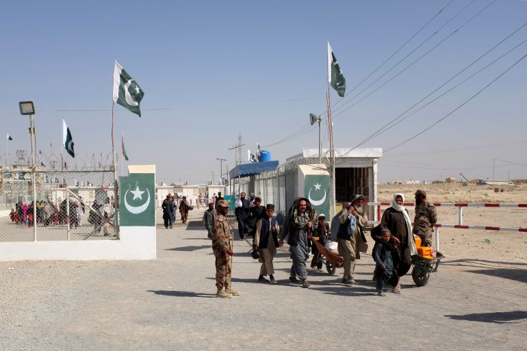 Pakistani soldiers keep guard at the border-crossing town of Chaman