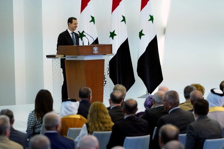 President Bashar al-Assad takes the oath of office for another term at the Syrian presidential palace in the capital, Damascus [Syrian Presidency via Facebook via AP)