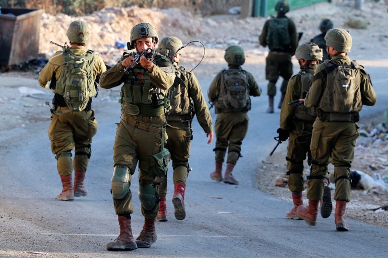 Israeli soldiers patrol the village of Salem, east of Nablus,