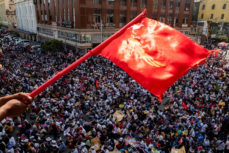 Demonstrators protest against the military coup in Yangon, Myanmar, February 17, 2021 [Stringer/Reuters]