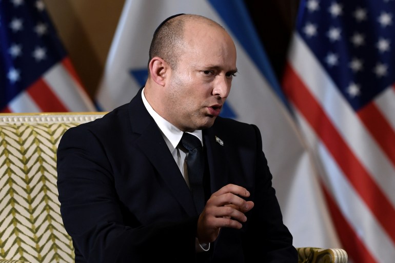Israeli Prime Minister Naftali Bennett speaks during a meeting with Secretary of State Antony Blinken at the Willard Hotel in Washington, DC, August 25 [Olivier Douliery/Pool/Reuters]