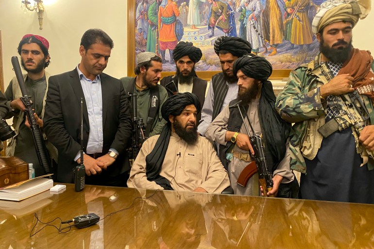 Taliban fighters take control of Afghan presidential palace after the Afghan President Ashraf Ghani fled the country, in Kabul, Afghanistan, Sunday, August 15, 2021 [Zabi Karimi/ AP]