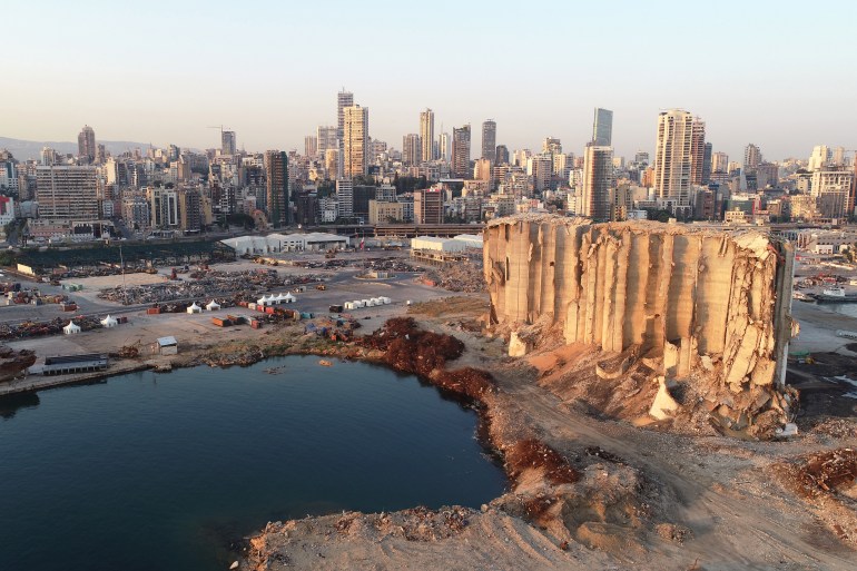 A picture taken with a drone shows the damaged grain silos at the destroyed port area, one year after a huge explosion hit the? city in Beirut, Lebanon, 31 July 2021 (issued 03 August 2021). At least 200 people were killed, and more than six thousand injured in the Beirut blast that devastated the port area on 04 August. It is believed to have been caused by an estimated 2,750 tons of ammonium nitrate stored in a warehouse.