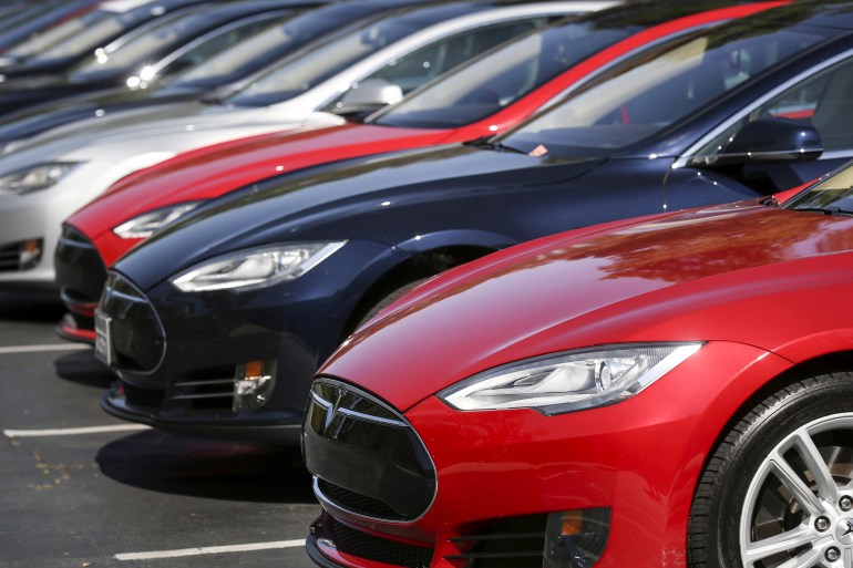 A row of Tesla Model S sedans