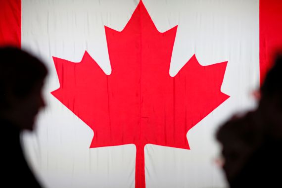Close up of maple leaf on Canadian flag