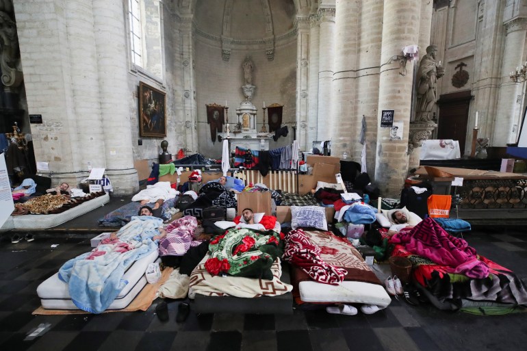 Asylum seekers protesting for the right to live and work legally in Belgium took part in a hunger strike for more than 7 weeks at the Saint-Jean-Baptiste au Beguinage church, in Brussels, July 19 [Reuters/Yves Herman]