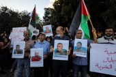 People take part in a demonstration in support of the six Palestinian prisoners who escaped from Gilboa prison, in Nazareth on September 11, 2021 [Reuters/Ammar Awad]