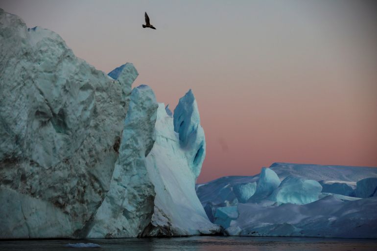 Icebergs are seen at the mouth of the Jakobshavn ice fjord during sunset near Ilulissat, Greenland, September 16, 2021