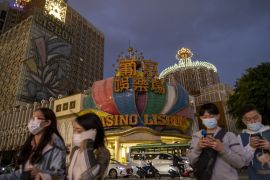 Shares in Macau casino operators soared up to 13 percent after the city&#39;s leader said China would resume tours for mainland Chinese [File: Justin Chin/Bloomberg]