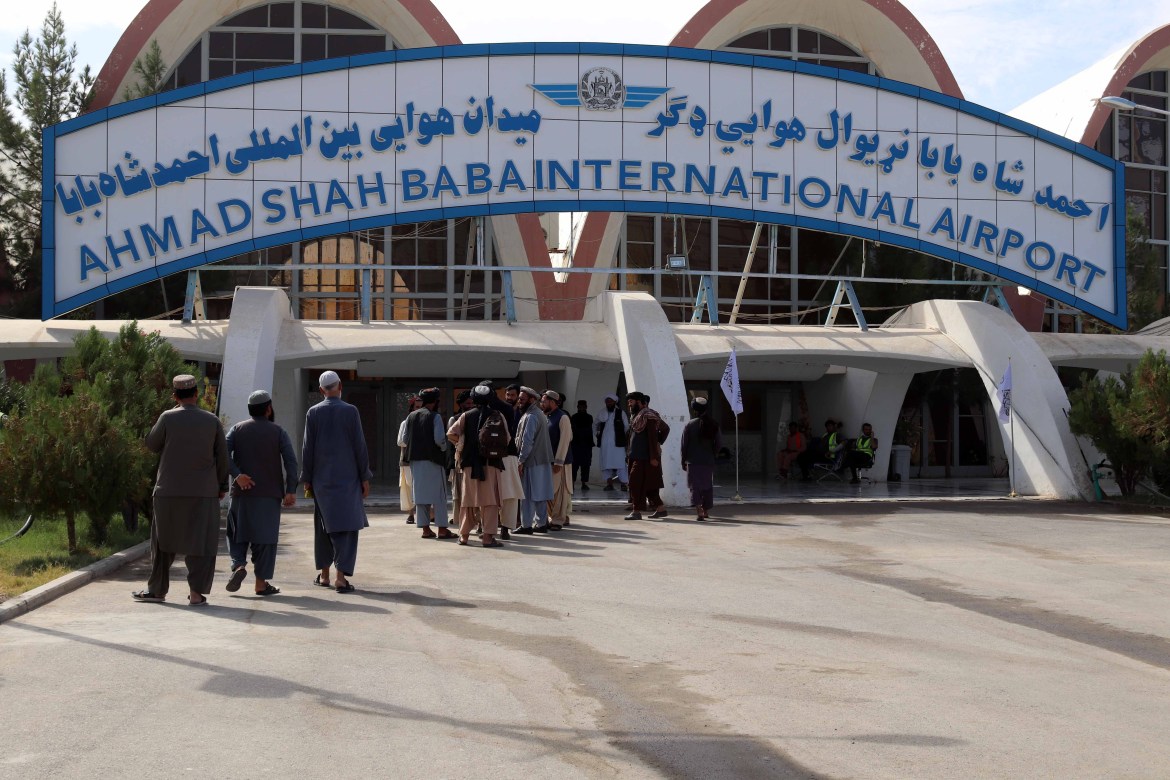 Passengers arrive at Ahmad Shah Baba International Airport in Kandahar. [EPA]