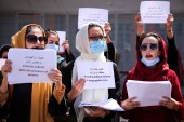 Afghan women&#39;s rights defenders and civil activists demonstrate calling for the preservation of their achievements and education under the Taliban government, in front of the presidential palace in Kabul, on September 3, 2021 [File: Reuters/Stringer]