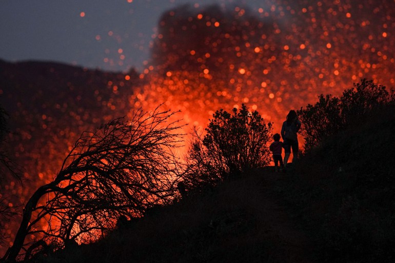Lava cascades from La Palma volcano as Spain promises help | Volcanoes News  | Al Jazeera