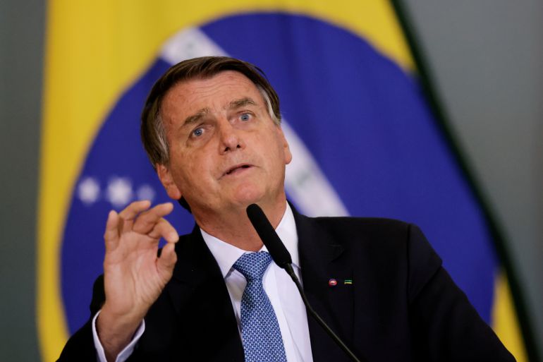 Brazil's President Jair Bolsonaro gestures during the ceremony