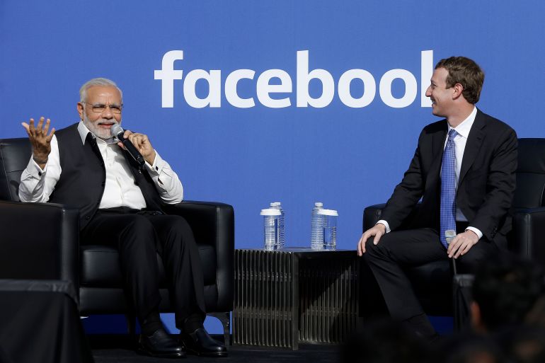 India's Prime Minister Narendra Modi speaks next to Facebook CEO Mark Zuckerberg in Menlo Park, California