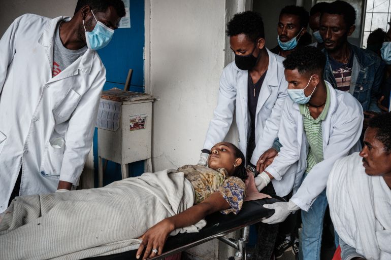 Injured patient lying on a stretcher at Mekelle General Hospital