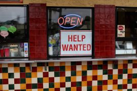 A help wanted sign is posted at a taco stand in Solana Beach, California, US