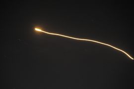 Syrian air defence systems intercepting Israeli missiles over Syria.