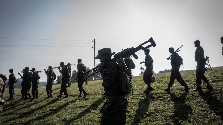Ethiopian National Defence Forces (ENDF) soldiers walk in line during a training session in the field of Dabat, 70 kilometers Northeast of the city of Gondar, Ethiopia, on September 15, 2021
