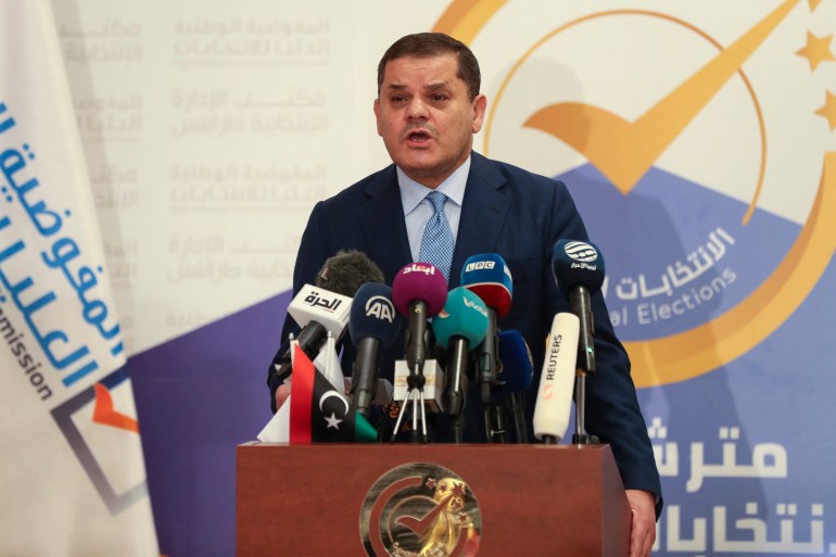 Libyan interim Prime Minister Abdulhamid Dbeibah speaks after registering his candidacy for next month's presidential election on November 21, 2021 in the capital Tripoli.