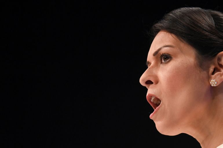 UK Home Secretary Priti Patel speaks at a Conservative party conference in Manchester