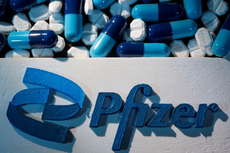 Pfizer logo and pills