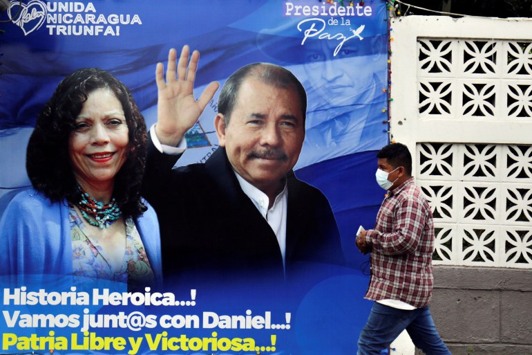 a billboard showing Nicaraguan president Daniel Ortega and his wife, VP Rosario Murillo