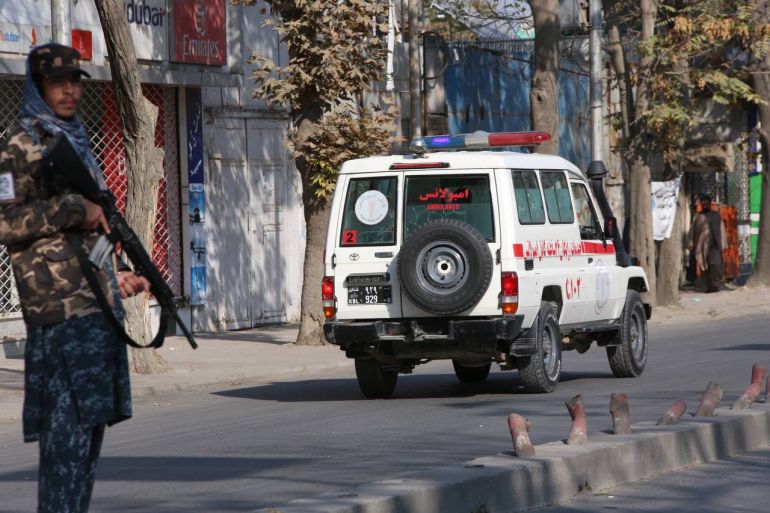 Taliban members take security measures and block roads