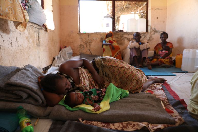 Ethiopian refugees rest in Qadarif region, easter Sudan, Friday, Nov 20, 2020. Thousands of Ethiopians fled the war in Tigray region into Sudan
