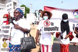 Protest by relatives of victims of the rule of Yahya Jammeh, the former President of the Gambia [Screen grab/ Al Jazeera]