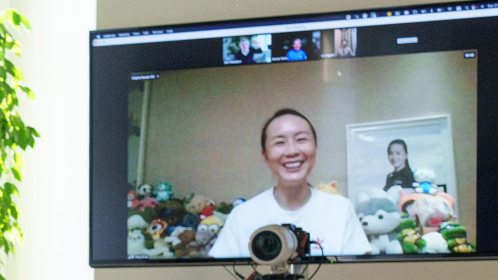 In video call, Chinese tennis player Peng Shuai says she is safe