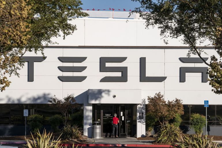 A worker enters a Tesla factory in Lathrop, California, U.S.