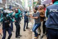Police raise batons on Bangladesh Nationalist Party (BNP) supporters