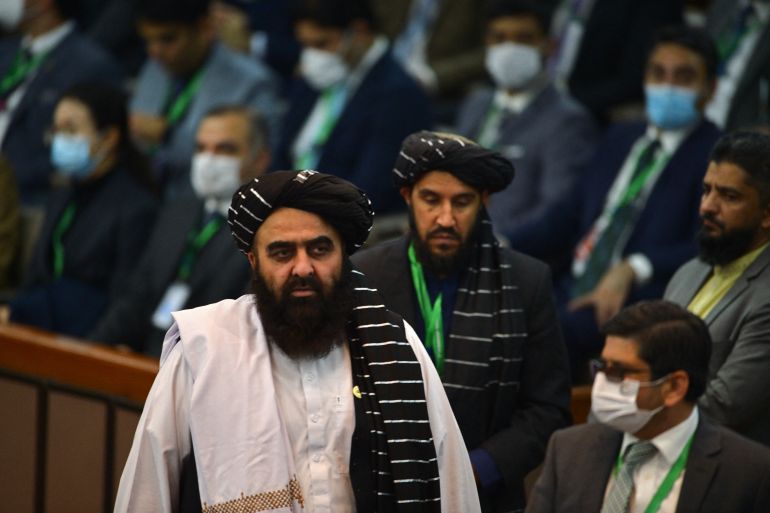 Afghanistan's Taliban Foreign Minister Amir Khan Muttaqi arrives to attend the opening of a special meeting of the 57-member Organisation of Islamic Cooperation in Islamabad, Pakistan, on December 19, 2021.