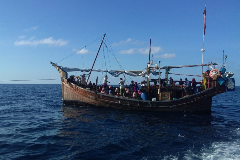 A wooden boat transporting Rohingya refugees after it was intercepted in the waters off Bireuen, Aceh province and were denied refuge in Indonesia