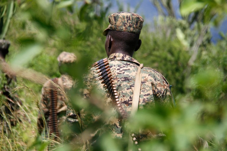Military personnel patrol on November 29, 2016 in Kasese, Uganda