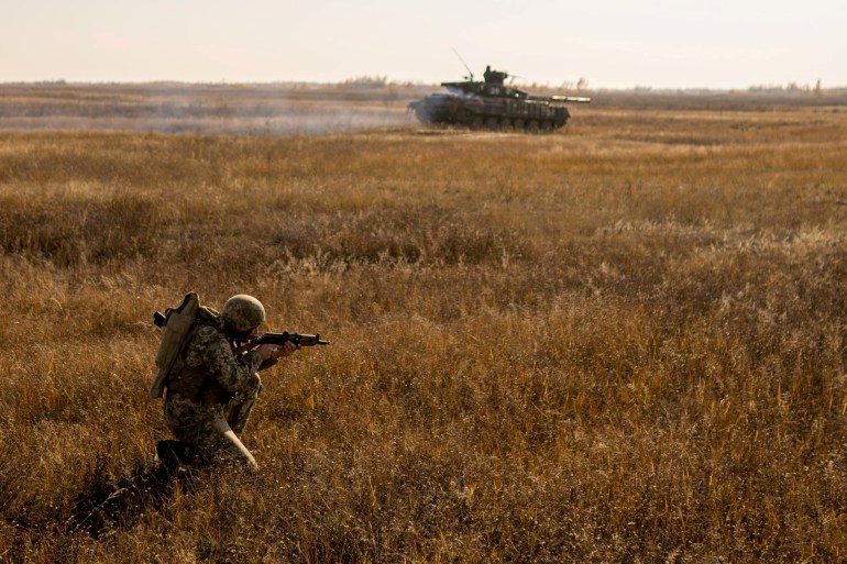 A serviceman of the Ukrainian Armed Forces takes part in military drills at a training ground near the border with Russian-annexed Crimea in Kherson region.