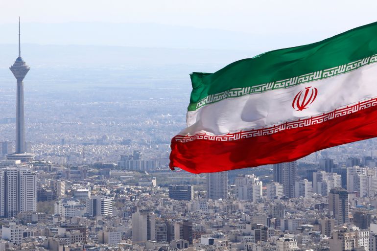 Iran's national flag waves in Tehran, Iran