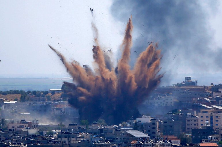 A blast from an Israeli airstrike on a building in Gaza City in May
