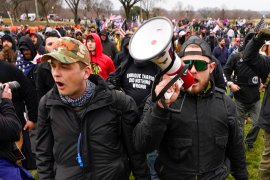 Proud Boys members Zachary Rehl, left, and Ethan Nordean, with handheld megaphone, walk toward the US Capitol in Washington, in support of President Donald Trump on January 6