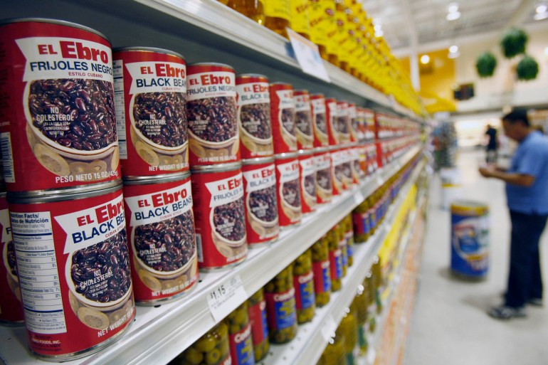 Shelves stacked with typical Latin foods and ingredients such as black beans "Cuban Style" at a Publix Sabor store in Hialeah, Florida, United States