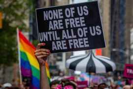 In 29 US states, LGBTQ individuals must live every day without any legal protections for their sexual orientation and gender identity - and this is unacceptable, writes Williams [Erik McGregor/LightRocket via Getty Images]