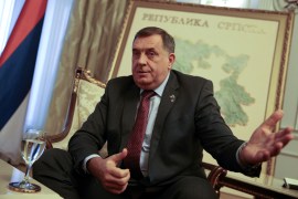 Bosnian Serb leader Milorad Dodik gestures during an interview in his office