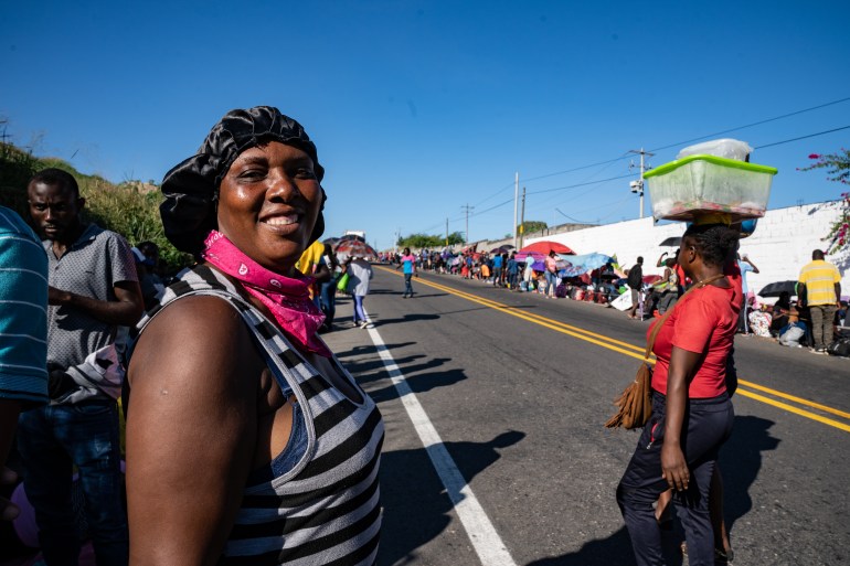 Rosita, a Haitian asylum seeker, waits in a queue in southern Mexico