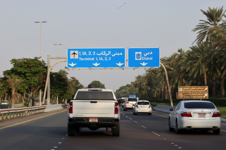 Cars on the road to Abu Dhabi airport.